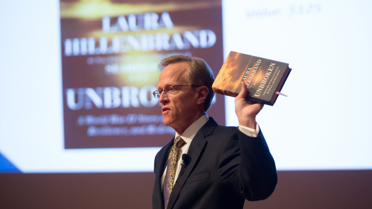 Tom Butch speaks during a private screening of Unbroken at The National World War I Museum