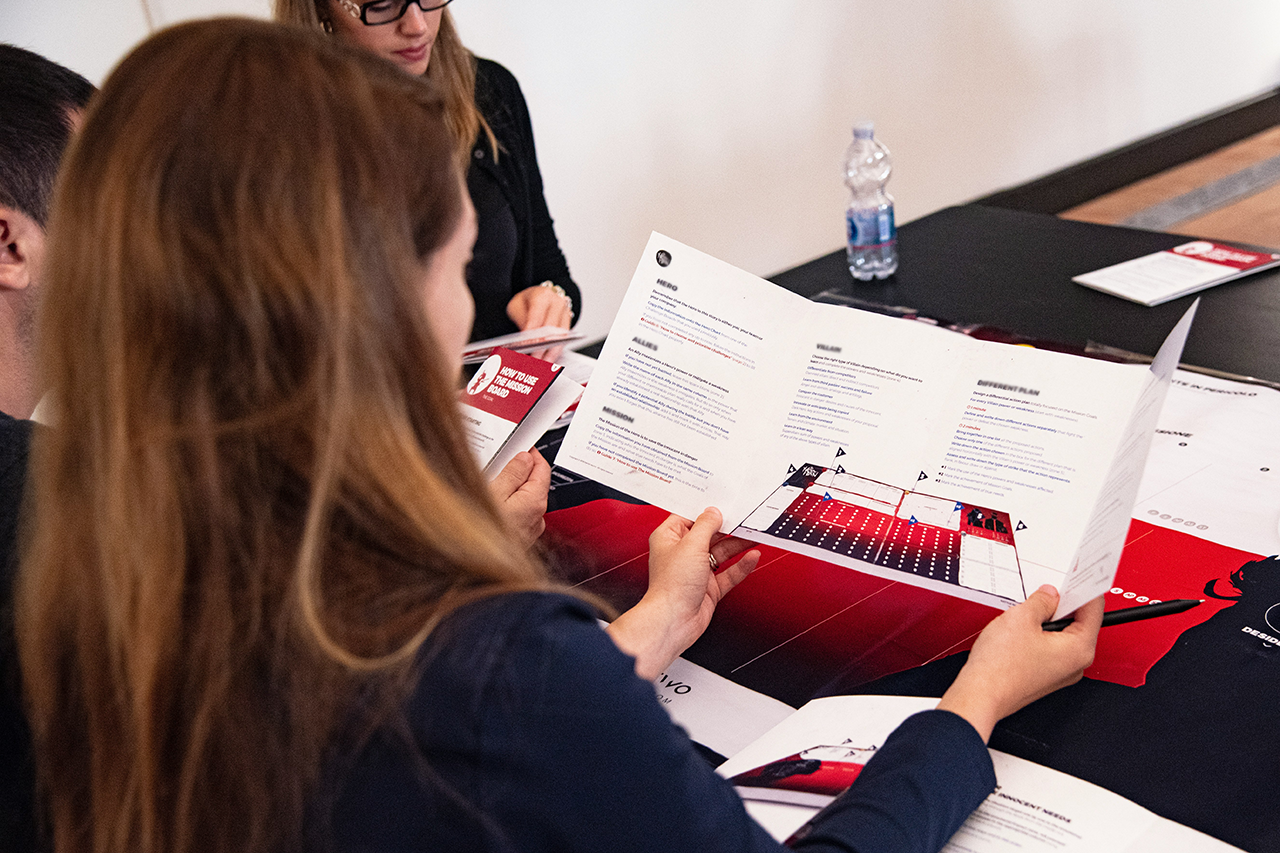 woman reading a fundraising brochure