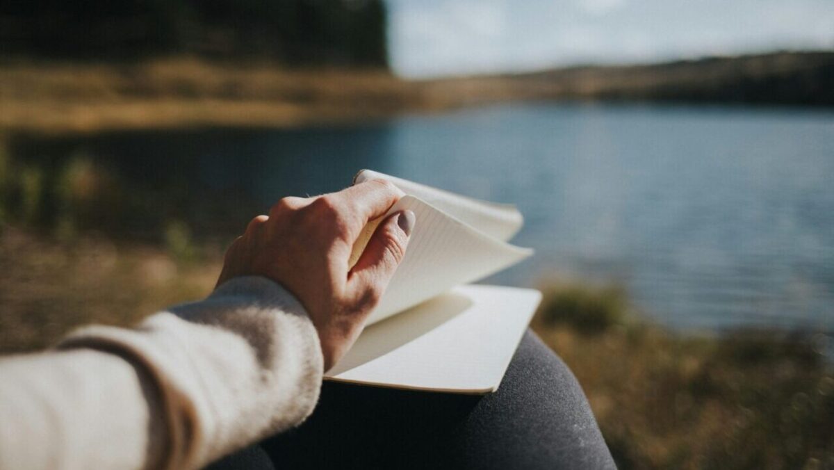 opening a blank journal in nature